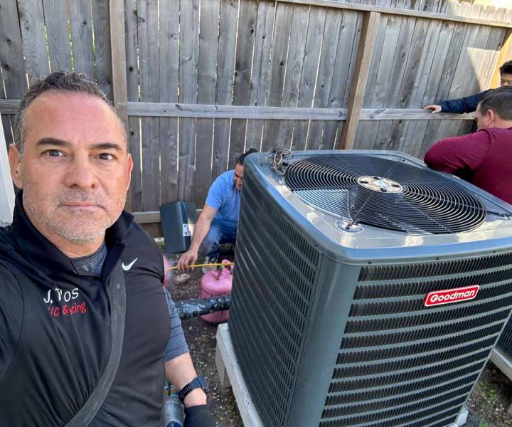 Skilled HVAC professional testing AC system performance with advanced diagnostic equipment