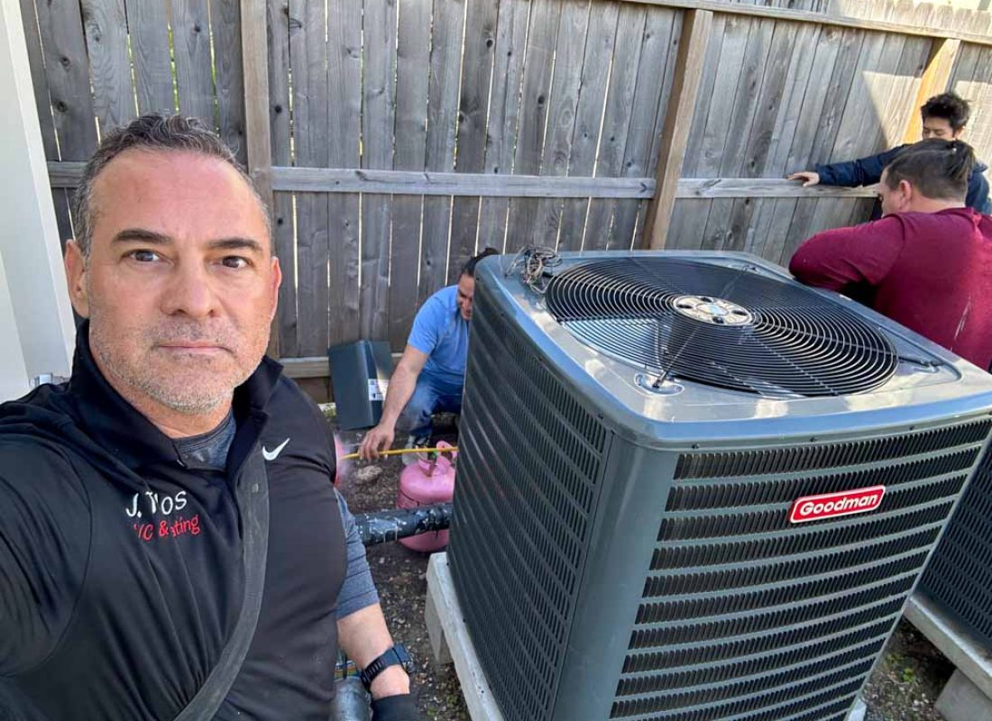 Skilled HVAC professional testing AC system performance with advanced diagnostic equipment