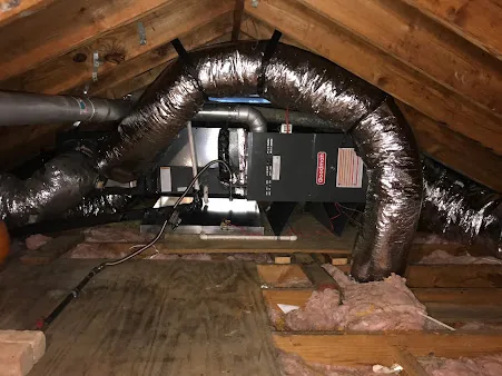 Long runs of insulated flex duct and an air handler in an attic